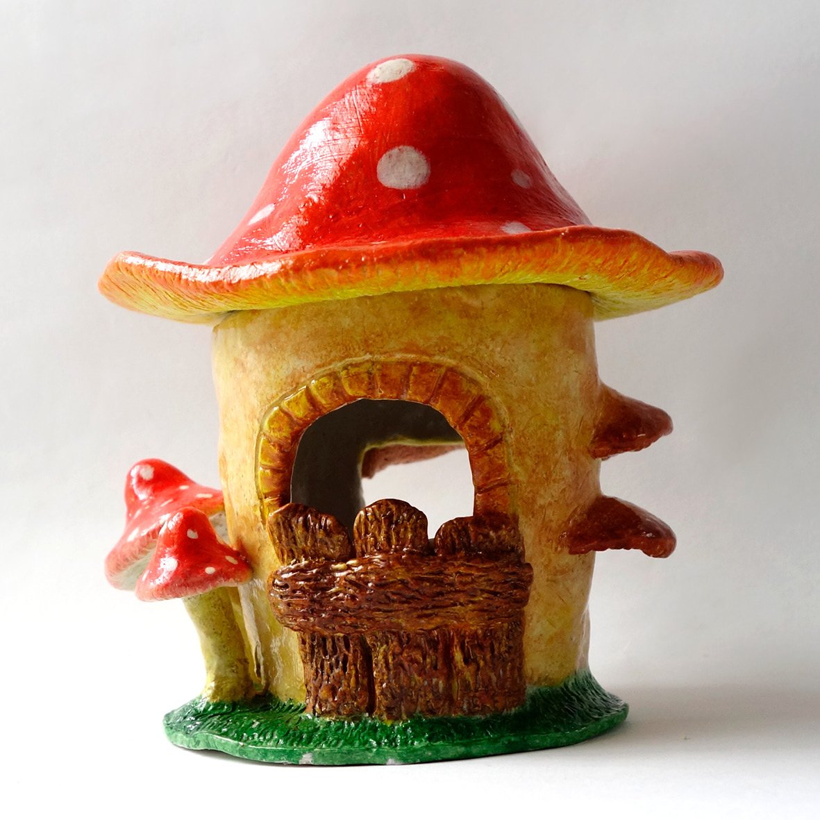 Fairy mushroom house made from air dry clay during workshop.