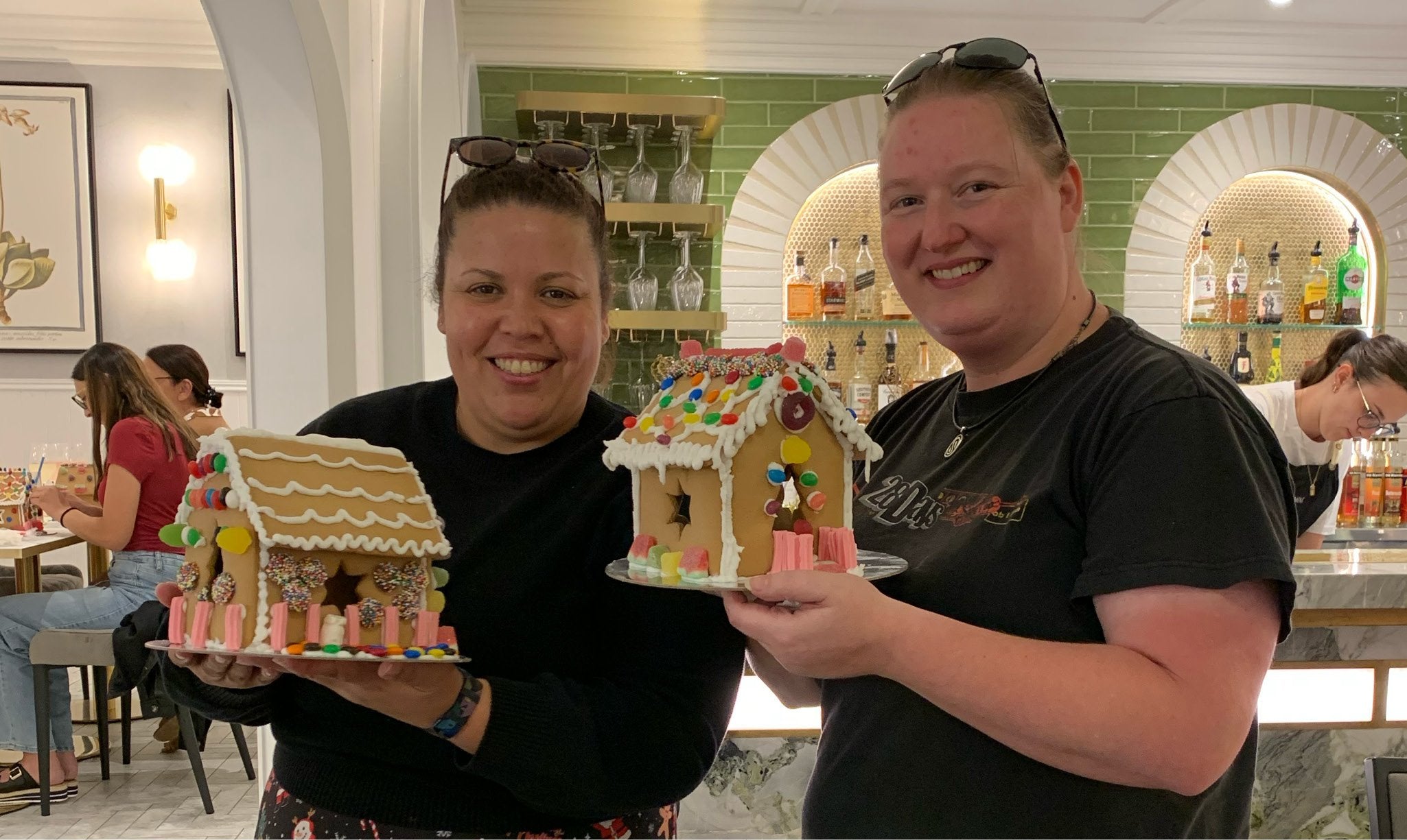 Get together event with your family and friend building and decorating gingerbread house.