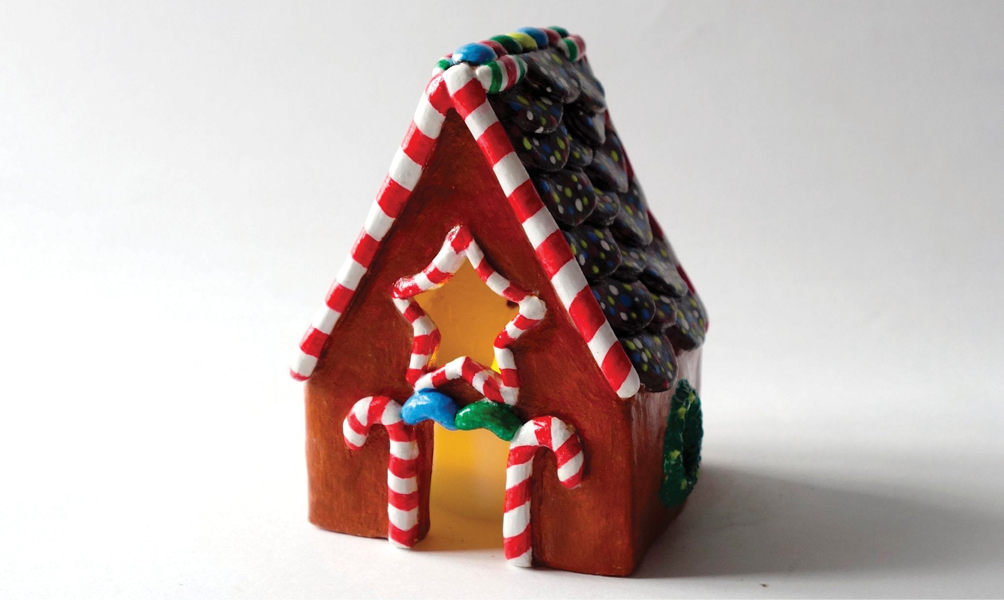 Gingerbread house made from air dry clay.